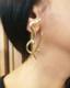 Earrings are like orgasms par Joyce Zurub